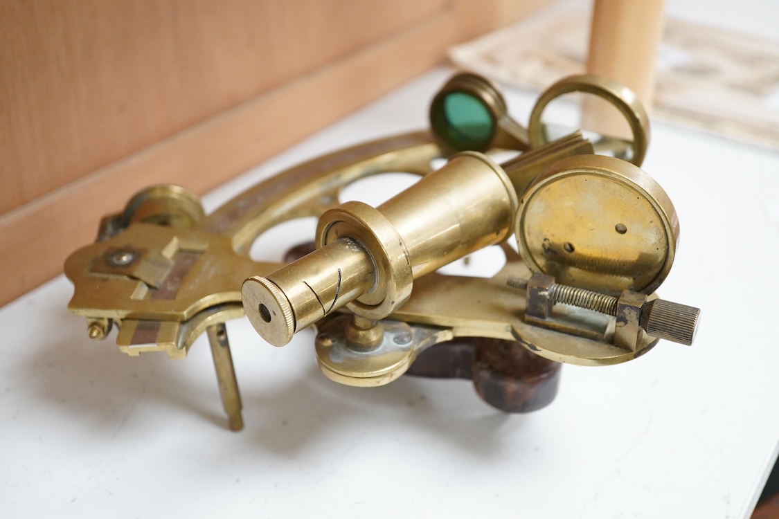 A late 19th century brass sextant by Ryland & Son Ltd. London, with later oak grip